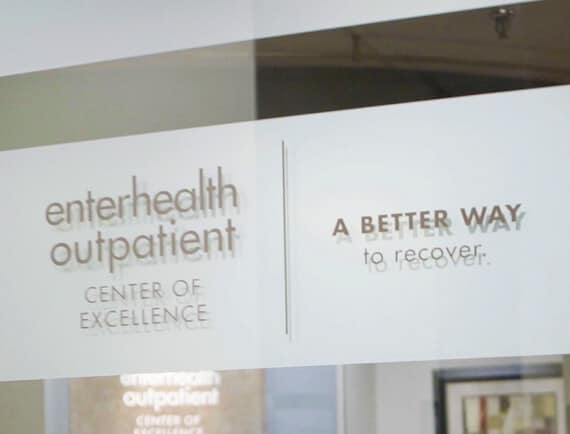 Signage on the front door of the Enterhealth Outpatient Center of Excellence