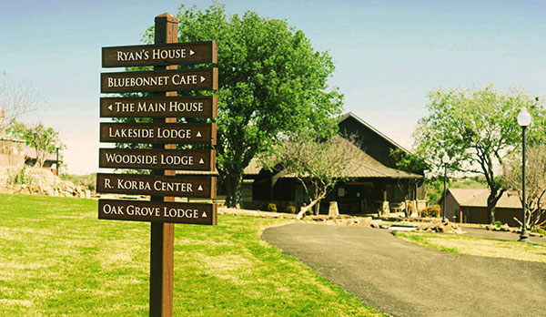 Sign at Enterhealth Ranch directing to various buildings and facilities.