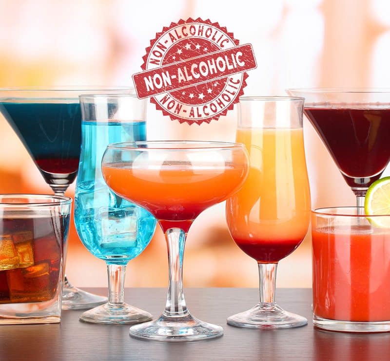 A collection of non-alcoholic drinks that look like cocktails, with a label that says non-alcoholic above them.